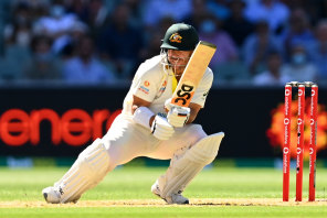 David Warner ducks under a bouncer on day one of the second Test in Adelaide on Thursday.