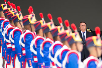 Brazilian President Jair Bolsonaro watched the change of the presidential guard at Planalto Palace in Brasilia on December 16.