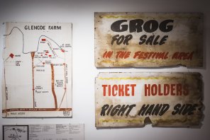 A site map and signs salvaged from the Sunbury music festivals.