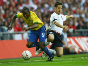Mineiro and England’s Joe Cole in an international friendly match between England and Brazil at Wembley Stadium in 2007.