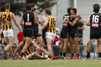 The Daicos brothers in the thick of it.