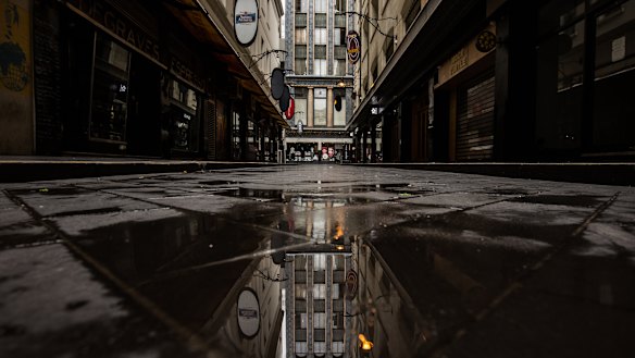 Degraves Street has been deserted during Melbourne's stage four lockdown and the Ombudsman said she would factor in COVID-19 hardship when it comes to prosecuting.