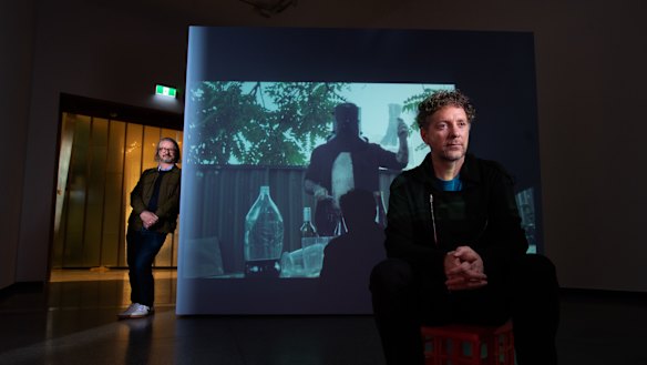 Sydney Biennale artistic director Brook Andrew (seated) and ACCA artistic director Max Delany. 