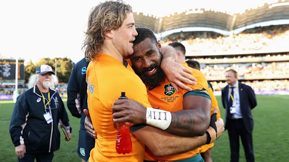 Australia’s tryscorers Fraser McReight and Marika Koroibete savour a win.