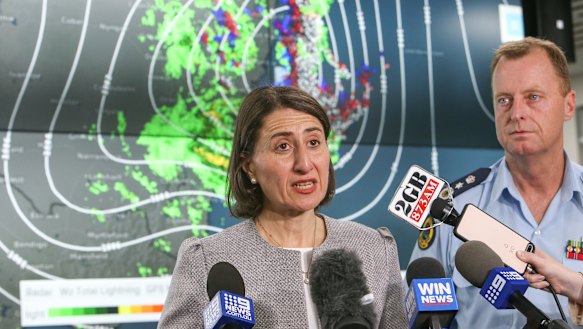 NSW Premier Gladys Berejiklian with State Emergency Service Commissioner Mark Smethurst at the SES headquarters in Wollongong.