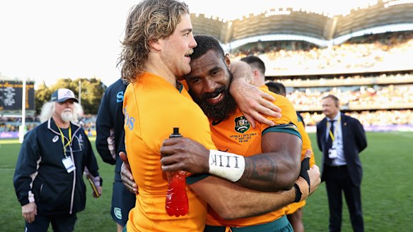 Australia’s tryscorers Fraser McReight and Marika Koroibete savour a win after the Wallabies’ win over South Africa in Adelaide last year.