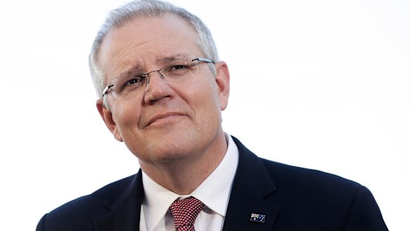 Prime Minister Scott Morrison defends Home Affairs Minister Peter Dutton during a media conference in Canberra.  