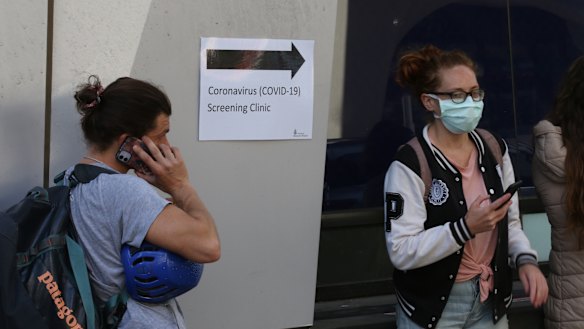 People line up outside the Royal Melbourne Hospital for coronavirus testing earlier this month.