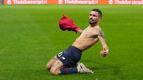 Lille’s Remy Cabella celebrates their sixth goal against Feyenoord.