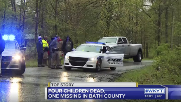 Authorities gather in Bath County after a horse and buggy carrying an Amish family was swept away Wednesday, while trying to cross a low-water bridge over a flooded creek.