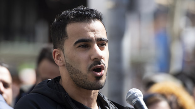 Footballer and refugee Hakeem al-Araibi speaks during a rally at the Victorian State Library in Melbourne.