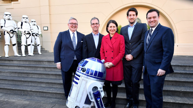 Much fanfare: (L-R) Arts Minister Don Harwin, Head of Industrial Light and Music Rob Bredow, NSW Premier Gladys Berejiklian, Industrial Light and Magic's Luke Hetherington and NSW Minister for Jobs Stuart Ayres at Fox Studios in Sydney. The NSW government announced Light & Magic, a Disney-owned visual effects company involved in the Star Wars films, will set up a studio in Sydney. 