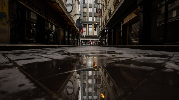Degraves Street has been deserted during Melbourne's stage four lockdown and the Ombudsman said she would factor in COVID-19 hardship when it comes to prosecuting.