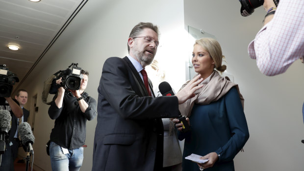 Senate President Scott Ryan departs after a radio interview on Monday on the Victorian election result.