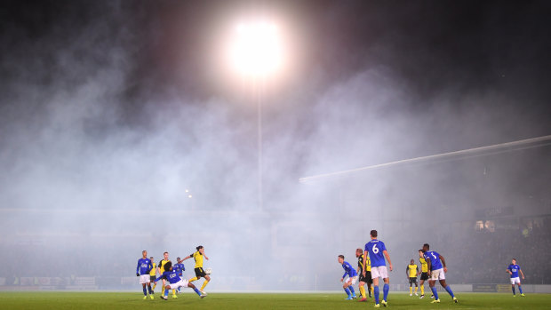 Fog envelops the round-of-16 match between Burton Albion and Leicester City at Pirelli Stadium in Burton-upon-Trent.
