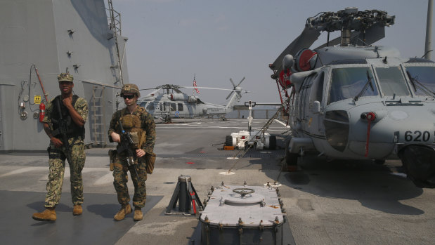 US marines patrol the USS Blue Ridge as it anchors off Manila, Philippines.