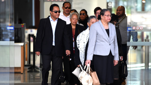 Supporters of Tuhirangi-Thomas Tahiata leave the Supreme Court in Brisbane on Monday.