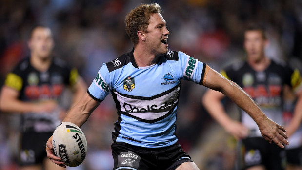 Fine return: Matt Moylan celebrates after scoring a try against his old side at Panthers Stadium.