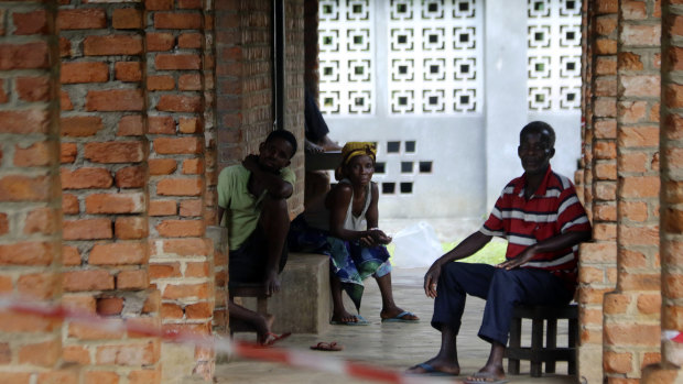 People suspected of having the Ebola virus wait at a treatment centre in Bikoro, Democratic Republic of Congo. 