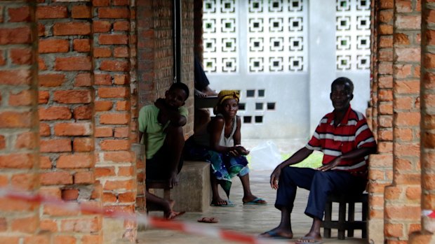 People suspected of having the Ebola virus wait at a treatment centre in Bikoro, Democratic Republic of Congo. 