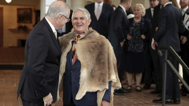Minister for Indigenous Australians Ken Wyatt, pictured with Prime Minister Scott Morrison, is trying to broker a historic peace deal.