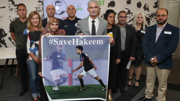 Campaign: Football officials and Human Rights Group members show their support for Hakeem last month.