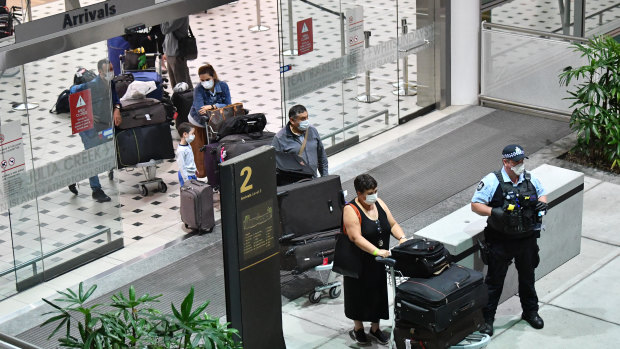 Australians evacuated from South America due to COVID-19 were met by police at Brisbane Airport on Tuesday.