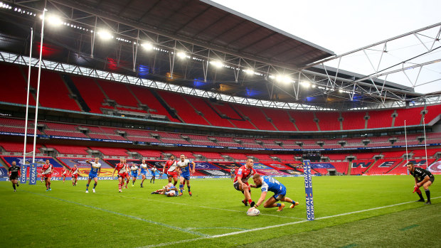 Ash Handley of Leeds Rhinos scores his sides second try at an empty Wembley.