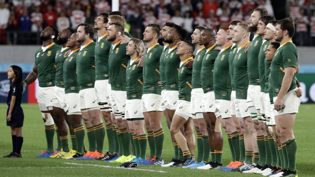 In harmony: South Africa sing their national anthem before their quarter-final against Japan.