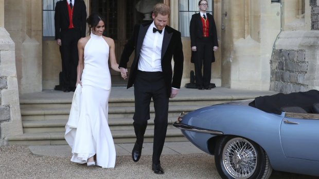 The newly married Duke and Duchess of Sussex, Meghan Markle and Prince Harry, leave Windsor Castle after their wedding.