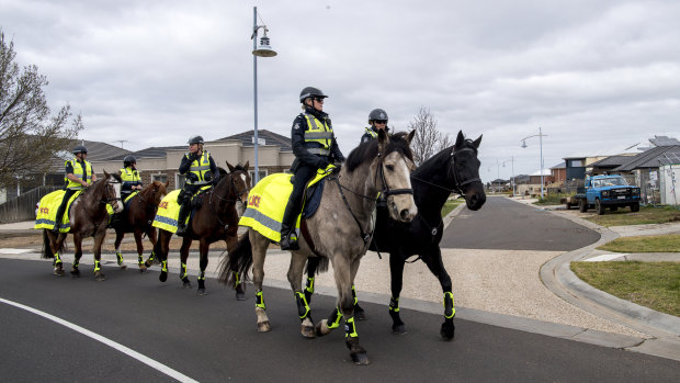 Mounted police patrol the streets of Taylors Hill on Thursday morning.