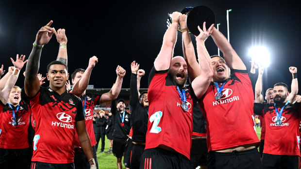 The Crusaders celebrate winning the Super Rugby Pacific final over the Chiefs.