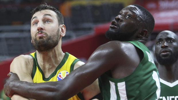 Andrew Bogut in action against Senegal's Youssoupha Ndoye.