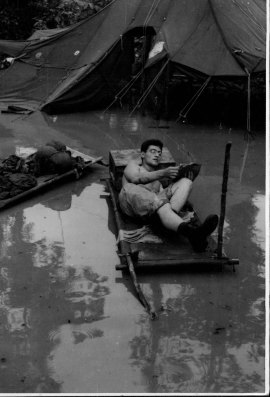 Torrential rain floods a US Army camp in New Guinea in July 1944.