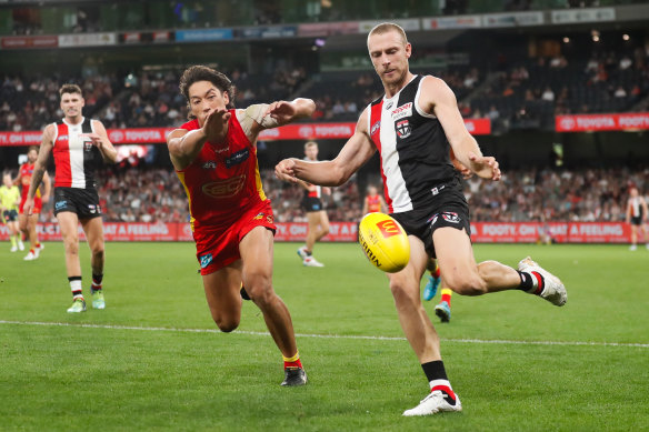 Saint Callum Wilkie gets a kick away.