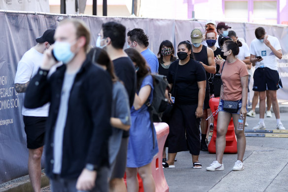 People queue at the RPA Hospital Covid-19 testing centre on Wednesday in Sydney.