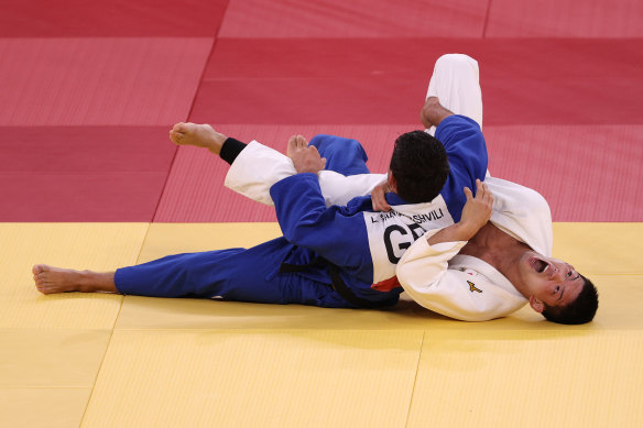 Shohei Ono of Japan defeats Lasha Shavdatuashvili of Georgia during the men’s judo 73kg Final on day three of the Tokyo Olympics.