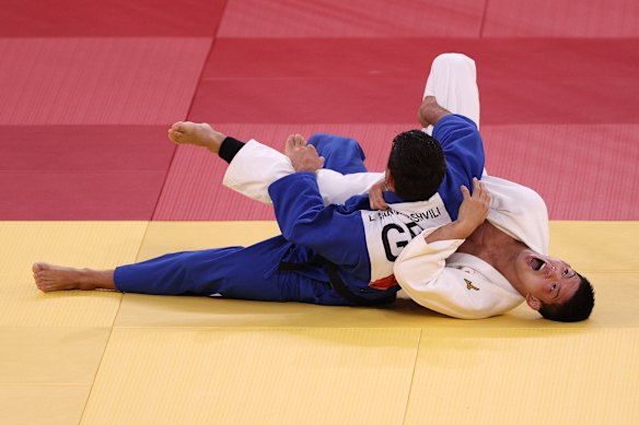 Shohei Ono of Japan defeats Lasha Shavdatuashvili of Georgia during the men’s judo 73kg Final on day three of the Tokyo Olympics.