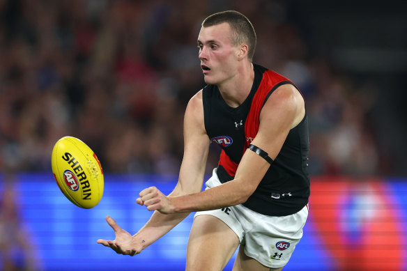 Essendon’s Nik Cox has been cleared injury despite being subbed out with a hamstring problem last round.