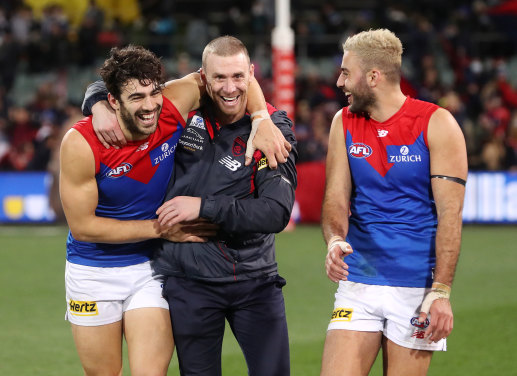 Christian Petracca, Simon Goodwin and Christian Salem are in high spirits after Melbourne’s impressive win over Port Adelaide.