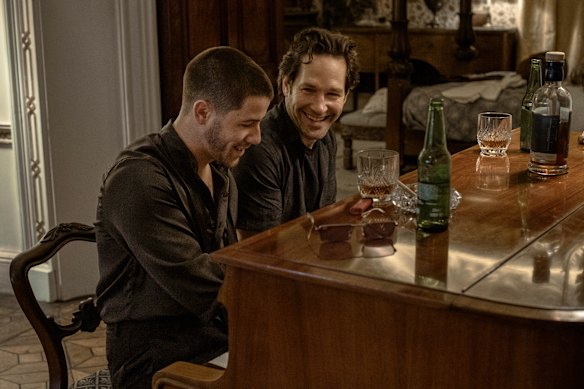 Nick Jonas, left, and Paul Rudd in a scene from Power Ballad.