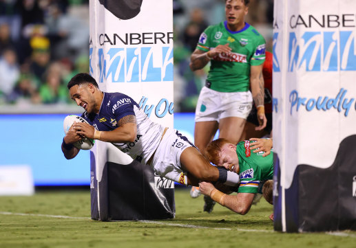 Valentine Holmes crashes over for a try in the second half.