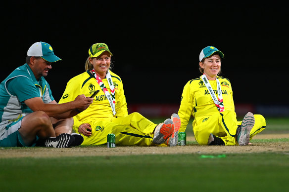 Matthew Mott, Meg Lanning and Rachael Haynes bask in the aftermath of their World Cup victory in Christchurch earlier this year.