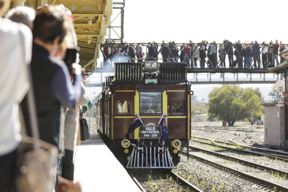 The coffin of former deputy prime minister Tim Fischer arrives at Albury train station on Thursday.
