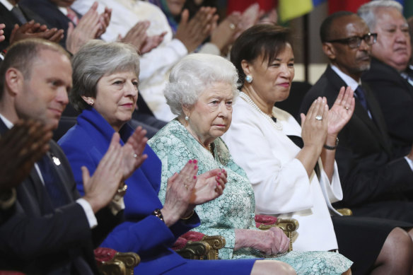 The Queen, Britain’s then Prime Minister Theresa May, second left, Prime Minister of Malta Joseph Muscat, left, and Baroness Patricia Scotland, attend the formal opening of the CHOGM in 2018.