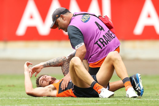 Brayden Maynard collected Daniel Lloyd, pictured, high as he tried to spoil a mark late in the second quarter.