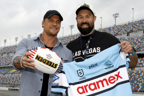 Reacher actor Alan Ritchson with Woods ahead of a NASCAR race at Daytona International Speedway in Florida.