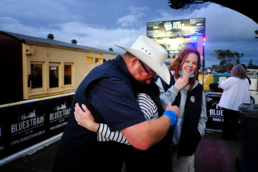 Blues Train operator Hugo T. Armstrong hugs his wife Desiree as his daughter Astrid looks on prior to The Blues Train departing on Saturday night.