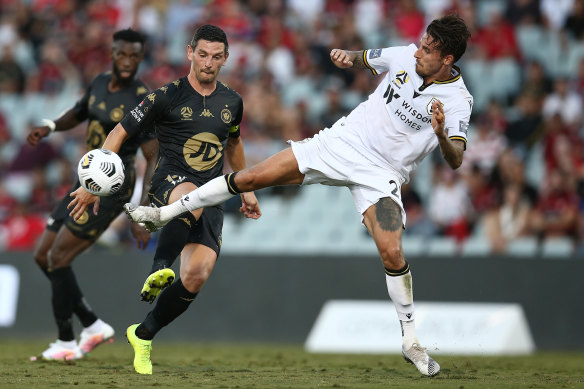 Graham Dorrans is challenged by Matt Derbyshire.