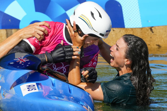 Jess Fox joins her sister Noemie celebrating a gold medal win in the kayak cross at the Paris Games.